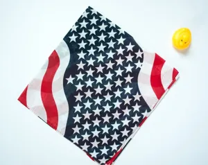 Detailed view of 100% cotton bandana featuring a stylized American flag star and stripe pattern.