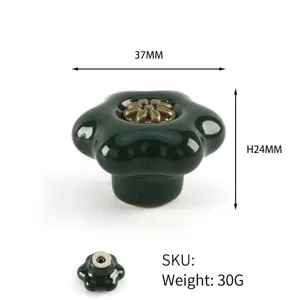 Macro detail of dark green flower ceramic drawer knob with dimensions and weight info.