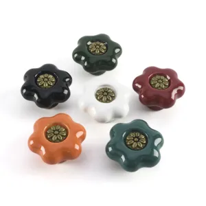 Set of six floral ceramic cabinet knobs in various colors for drawers and wardrobes