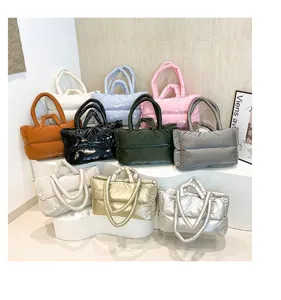 Selection of colorful puffer tote bags made of quilted space cotton in multiple shades