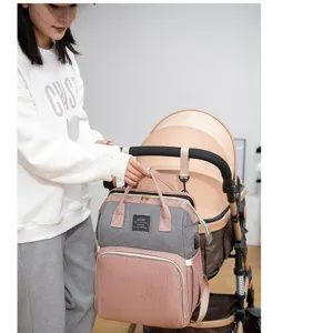 Multifunctionele luiertas rugzak, stijlvolle roze en grijze mama tas met kinderwagen riemen.