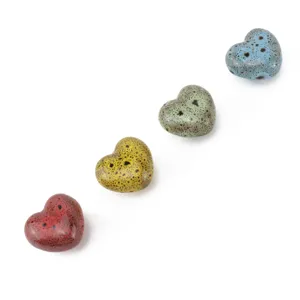 Pomelli per mobili e maniglie per cassetti a cuore in ceramica maculata colorata