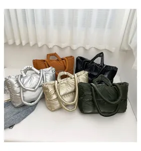 Collection of five padded space cotton tote bags for women in various colors and styles
