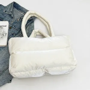 Minimalist white padded space cotton handbag with top handles for winter.