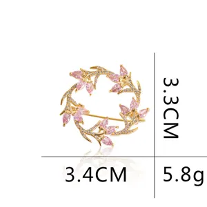 Detailed size guide for the swirling pink floral wreath brooch, 3.3cm by 3.4cm