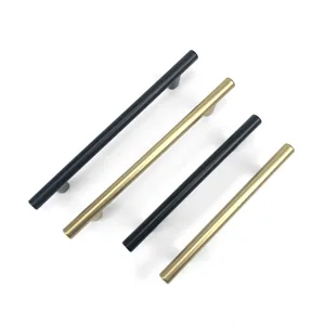 Detail view of modern black and gold stainless steel cabinet bar pull handles