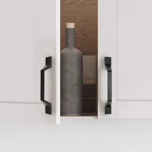 Detail van moderne zwarte meubelgrepen van aluminiumlegering op witte kastdeuren