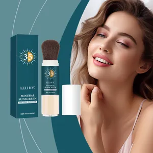 Poudre fixante solaire minérale avec pinceau, protection SPF 35 pour un maquillage parfait.