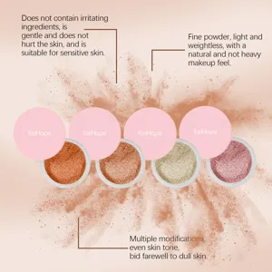 Close-up detail of four-color loose setting powder jars with fine texture and smooth finish.