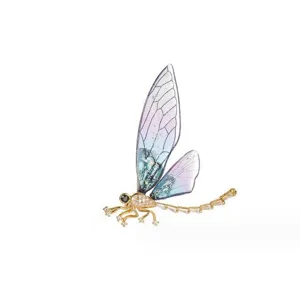 Macro view of a luxury dragonfly brooch with gradient crystal wings and gold finish