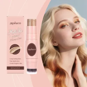 Champagne gold double-ended makeup stick with application brush for glowing skin