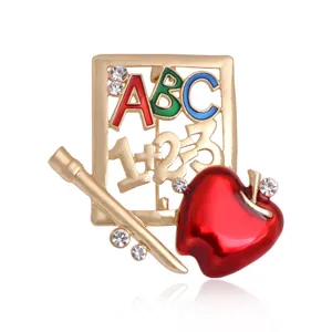Creative teacher appreciation brooch with apple, pencil and ABC letters in gold
