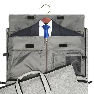Interior detail of a foldable garment bag with suit and tie inside