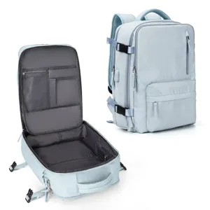 Detailed view of light blue travel backpack showing 180 degree open internal storage