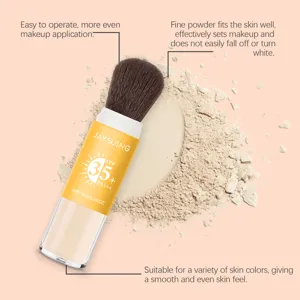 Λεπτομερής όψη φορητού πινέλου πούδρας με SPF 35, λεπτή υφή και ομοιόμορφη εφαρμογή.