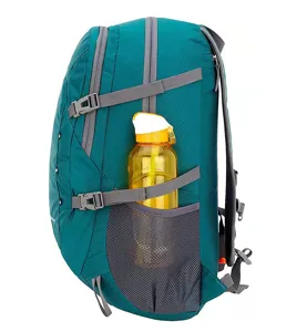 Detailed side view of 40L teal hiking backpack with mesh pocket and water bottle