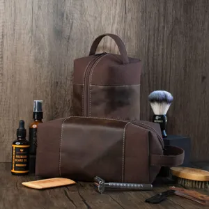 Vintage brown canvas and leather men's toiletry bag set in a grooming scene