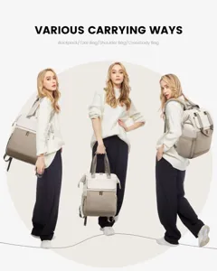 Detail view of women's beige laptop backpack showing various carrying ways for travel