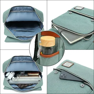 Canvas laptop backpack detail showing spacious interior and multiple storage compartments