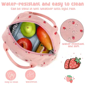 Detailed view of the strawberry patterned corduroy lunch bag showing its water resistance