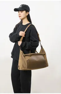 Grand sac a bandouliere en toile voyage decontracte sac de transport chic et elegante.