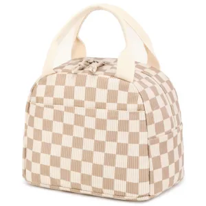 Side view of checkered corduroy lunch bag showing soft texture and sturdy top handles