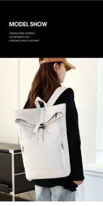 Rear view of a model wearing a stylish off-white roll-top backpack with buckle strap