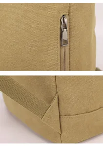 Close-up of durable canvas backpack fabric with metal zipper and strap stitching