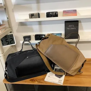 Grand sac de voyage en toile pour homme et femme, sac de weekend élégant et grande capacité.