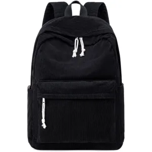 Detailed view of a black corduroy backpack with white rope zipper pulls on white background