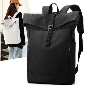 Detailed close-up view of a minimalist urban roll-top backpack with magnetic buckle and canvas texture