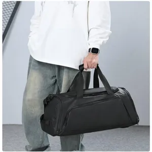 Grand sac de sport fitness noir voyage entraînement duffel bag avec compartiments.