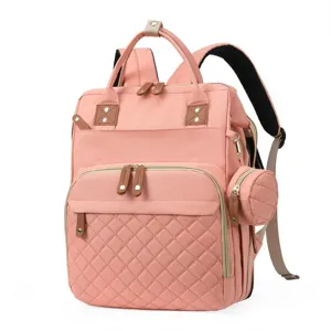 Rosa multifunktionaler Wickelrucksack mit Steppdesign und seitlicher Zubehörtasche