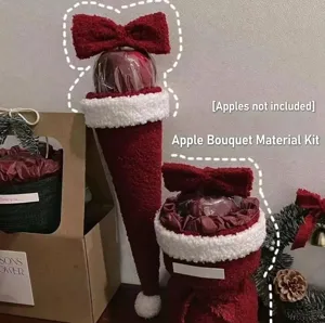 Detailed view of the red plush Christmas bow and DIY bouquet material components