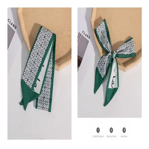 Green geometric twilly scarf, multi-purpose bag ribbon and stylish hair band accessory.