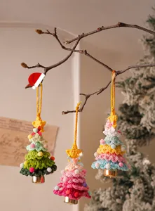 Handmade crochet Christmas tree hanging ornaments with bells, perfect for holiday home decor.