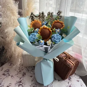 Detailed view of handmade crochet bouquet with sunflowers and blue roses for graduation