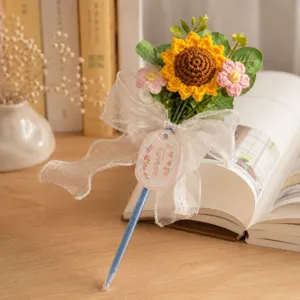 Cute knitted sunflower bouquet gel pen with ribbon bow, perfect teacher gift and stationery.