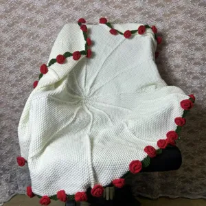 Handmade white crochet blanket with red roses, cozy floral knit throw for home decor gifts.