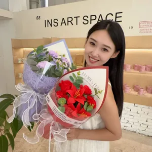 Elegant handmade soap flower bouquet featuring red roses and lilies for gift giving