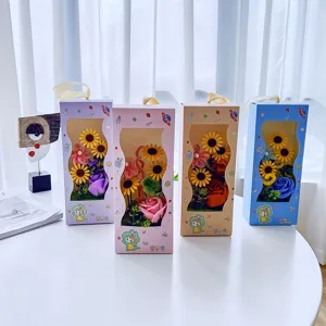 Detailed view of gift box featuring colorful soap roses and sunflowers for teacher day.