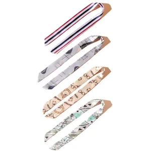Set of four long silk scarves with various retro geometric and stripe patterns