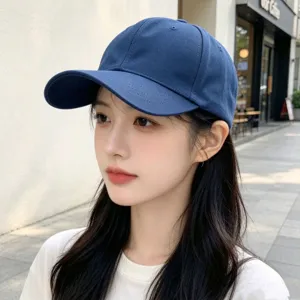 Solid color closed baseball cap for men and women, casual outdoor sun protection sports hat.