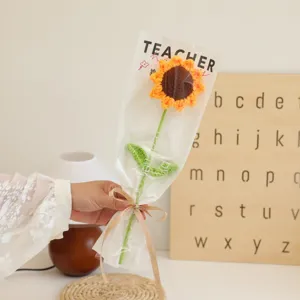 Handmade crochet sunflower bouquet in clear wrapping, perfect teacher day gift product detail.