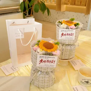 Handmade crochet sunflower bouquet gift box with tweed wrapping and greeting card for teacher.
