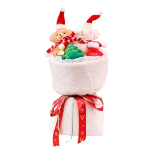 Festive Christmas plush teddy bear bouquet gift with red ribbon and mini holiday tree