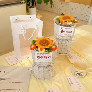 Handcrafted crochet sunflower potted plant with elegant tweed wrapping, perfect for teacher's day.