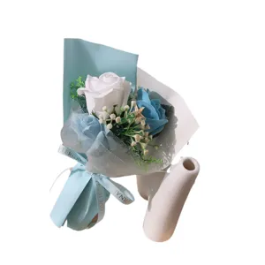 Artificial soap flower bouquet with blue and white roses, perfect gift for teachers and lovers.