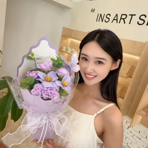 Close-up of elegant purple soap flower bouquet with detailed lace wrapping and butterfly