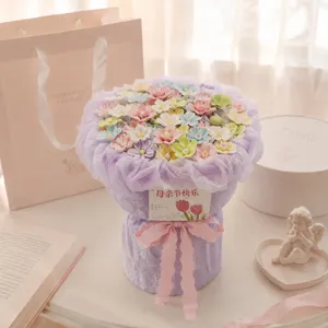 Exquisite ceramic flower bouquet detail shot, dopamine color floral art gift box with ribbon.